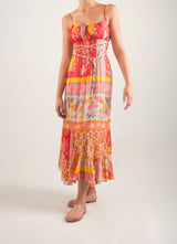 Vestido estampado con tiras de crochet y piedras