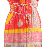 Vestido estampado con tiras de crochet y piedras